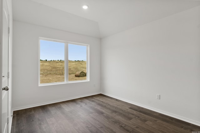 11089 River Valley Dr, Hensley, AR 72065 - unfurnished room with dark wood-style floors, lofted ceiling, and recessed lighting