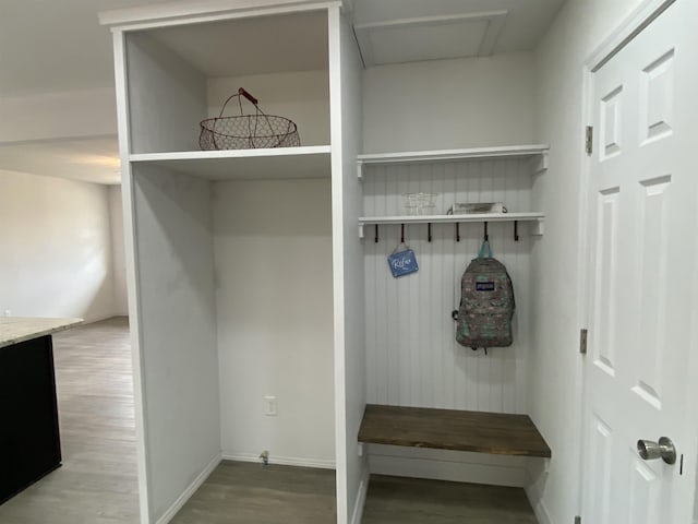 117 Circle Dr, Mount Ida, AR 71957 - mudroom featuring baseboards, wood finished floors, and attic access