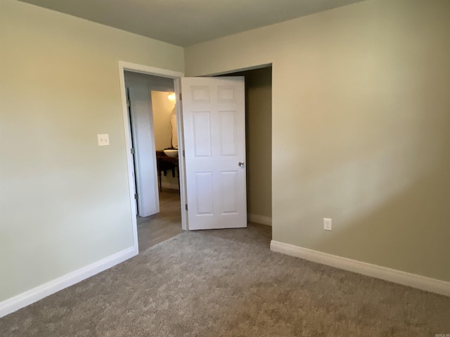 117 Circle Dr, Mount Ida, AR 71957 - unfurnished bedroom featuring carpet flooring and baseboards