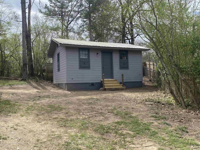 117 Circle Dr, Mount Ida, AR 71957 - exterior space with an outdoor structure, fence, metal roof, crawl space, and entry steps