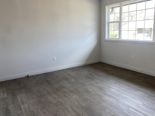 117 Circle Dr, Mount Ida, AR 71957 - spare room with dark wood-style floors and baseboards