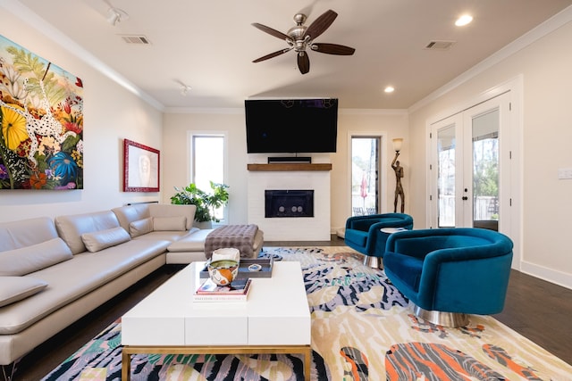 18 Ensbury Pl, Little Rock, AR 72223 - living room featuring a wealth of natural light, visible vents, and crown molding