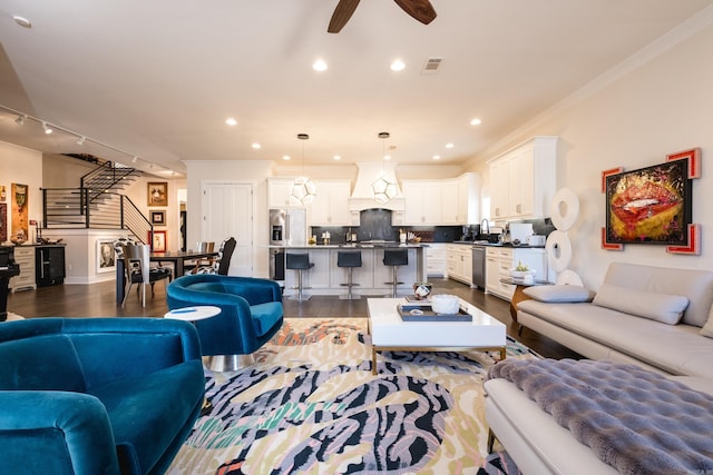 18 Ensbury Pl, Little Rock, AR 72223 - living room with stairway, a ceiling fan, dark wood-type flooring, visible vents, and recessed lighting