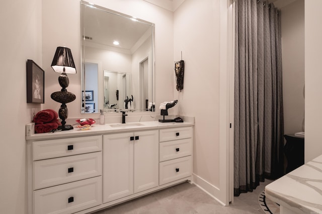 18 Ensbury Pl, Little Rock, AR 72223 - bathroom with vanity, baseboards, visible vents, ornamental molding, and recessed lighting