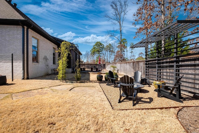 18 Ensbury Pl, Little Rock, AR 72223 - view of yard featuring a fenced backyard and a patio