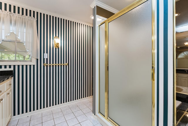 bathroom featuring wallpapered walls, tile patterned flooring, baseboards, and a shower stall