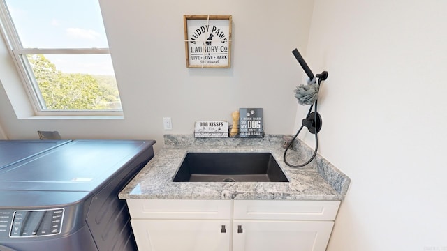 156 Waterfront Dr, Hot Springs, AR 71913 - interior space with white cabinets, washer / dryer, and light stone counters