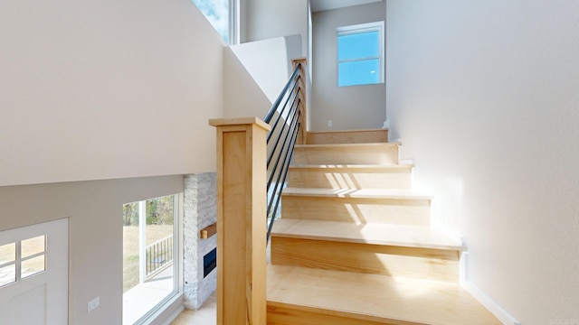 156 Waterfront Dr, Hot Springs, AR 71913 - stairway with a stone fireplace