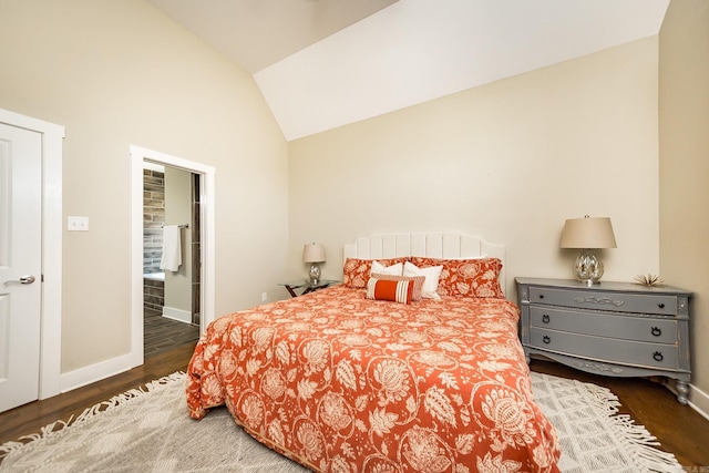 bedroom with baseboards, lofted ceiling, and wood finished floors