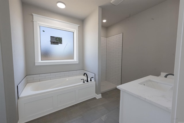 bathroom with visible vents, vanity, tile patterned floors, tiled shower, and a garden tub