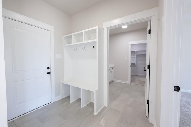 mudroom featuring baseboards