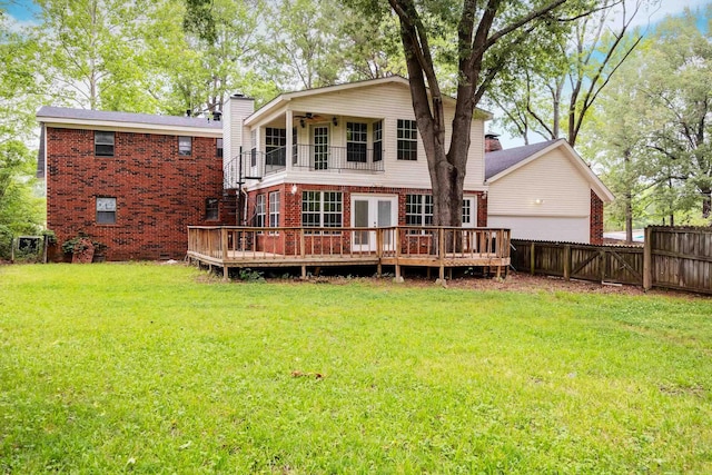 3636 T P White Dr, Jacksonville, AR 72076 - back of house with a chimney, brick siding, ceiling fan, a wooden deck, and stairs
