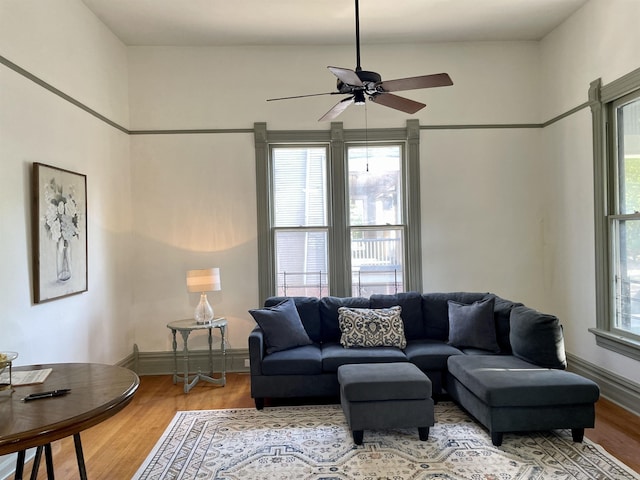 2107 Broadway St, Little Rock, AR 72116 - living area featuring ceiling fan, baseboards, and wood finished floors