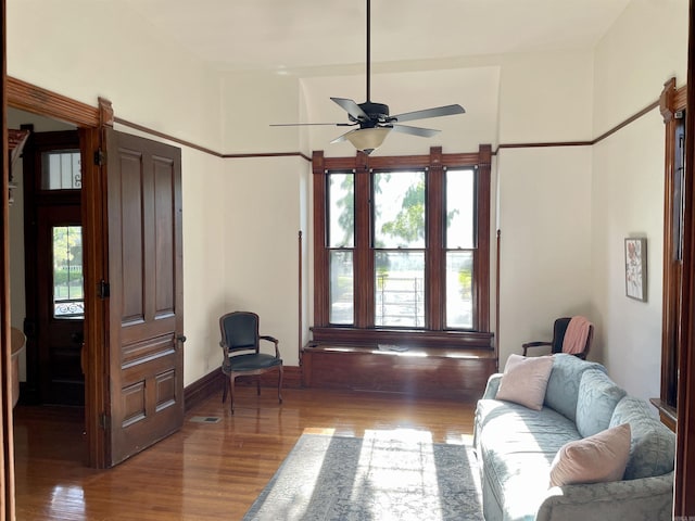 2107 Broadway St, Little Rock, AR 72116 - living room with plenty of natural light, a ceiling fan, wood finished floors, and baseboards