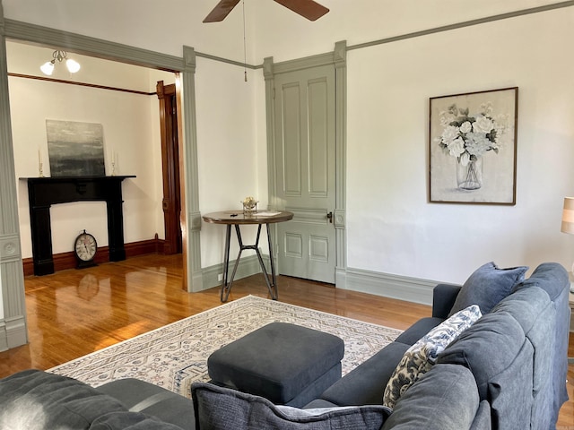 2107 Broadway St, Little Rock, AR 72116 - living area with baseboards, a ceiling fan, and wood finished floors