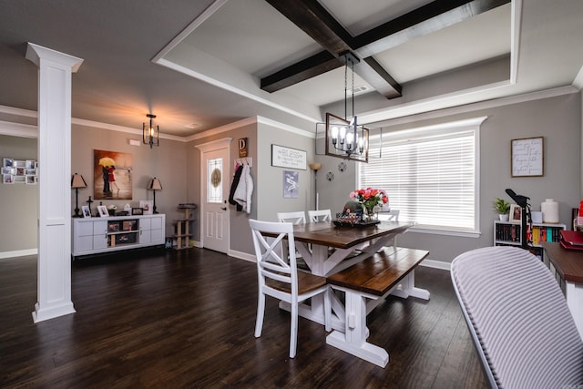 dining room with dark wood finished floors, baseboards, a notable chandelier, and ornate columns