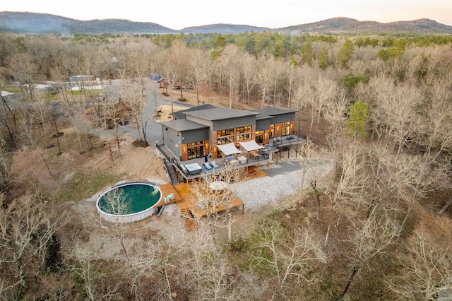 aerial view with a forest view and a mountain view