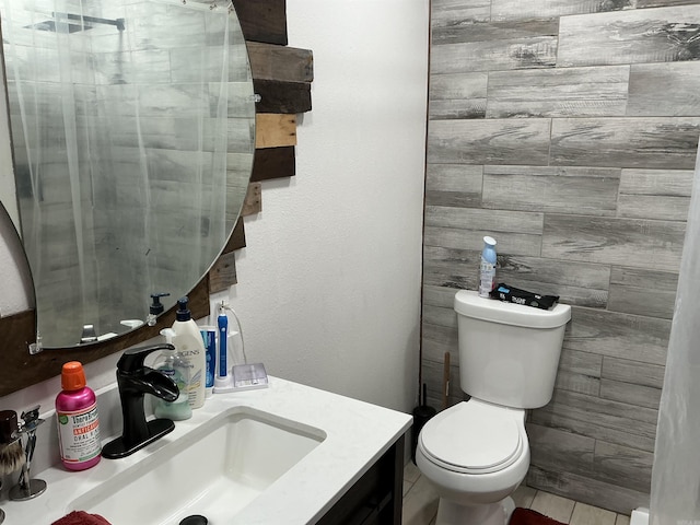 206 W High St, Sheridan, AR 72150 - bathroom featuring toilet, vanity, and tile patterned floors