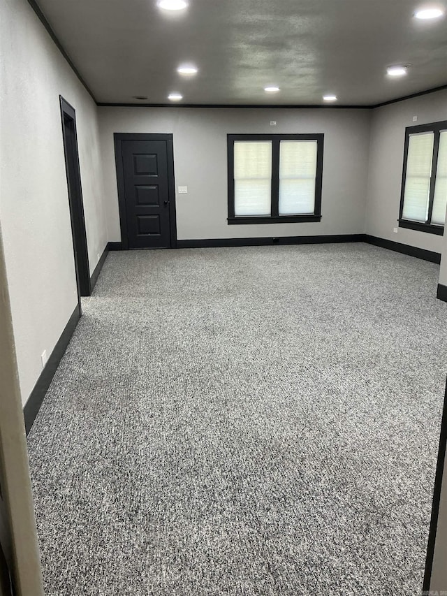 206 W High St, Sheridan, AR 72150 - spare room featuring baseboards, recessed lighting, and speckled floor