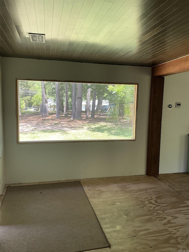 206 W High St, Sheridan, AR 72150 - spare room featuring wood ceiling