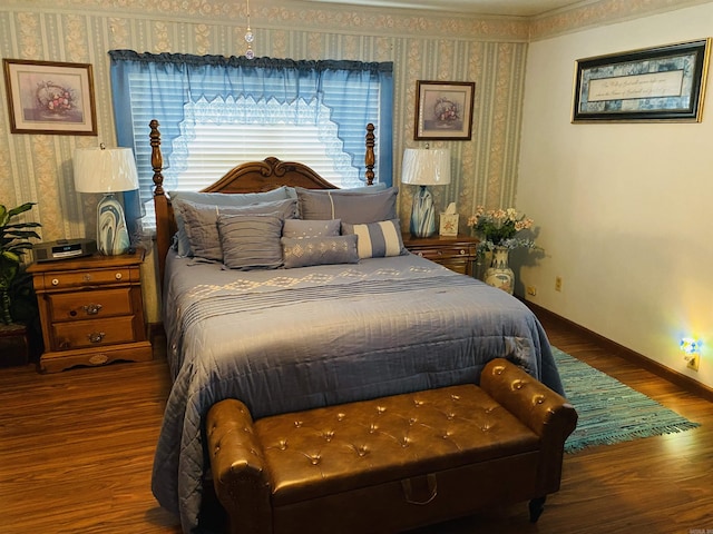 164 Polk Road 714, Mena, AR 71953 - bedroom featuring wallpapered walls, baseboards, and wood finished floors