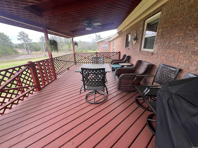 164 Polk Road 714, Mena, AR 71953 - wooden deck with a ceiling fan, an outdoor living space, and grilling area
