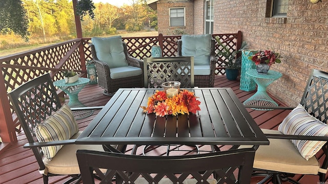 164 Polk Road 714, Mena, AR 71953 - wooden terrace with an outdoor hangout area