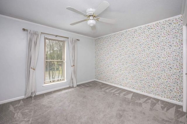 8224 Alvin Ct, Little Rock, AR 72227 - unfurnished room featuring crown molding, carpet floors, wallpapered walls, a ceiling fan, and baseboards