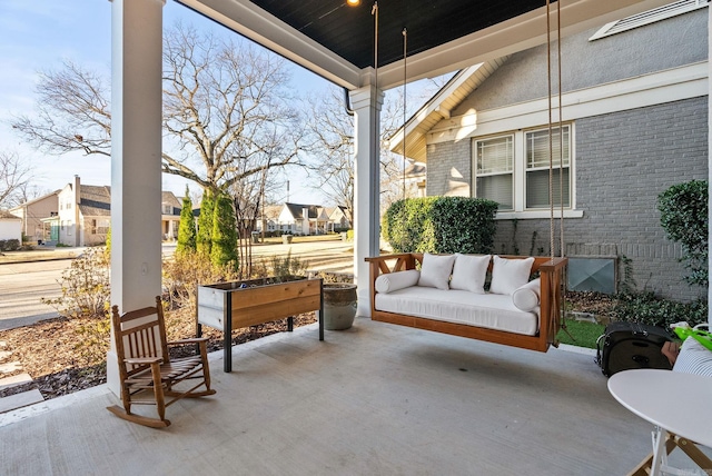 5204 Stonewall Rd, Little Rock, AR 72207 - view of patio featuring a residential view and outdoor lounge area
