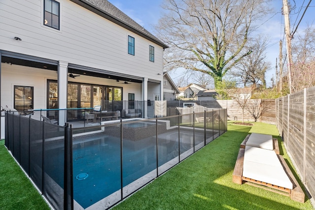 5204 Stonewall Rd, Little Rock, AR 72207 - view of swimming pool with a patio, a fenced backyard, a fenced in pool, a ceiling fan, and a lawn