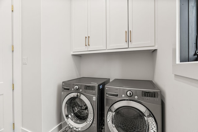 5204 Stonewall Rd, Little Rock, AR 72207 - laundry room with cabinet space and independent washer and dryer