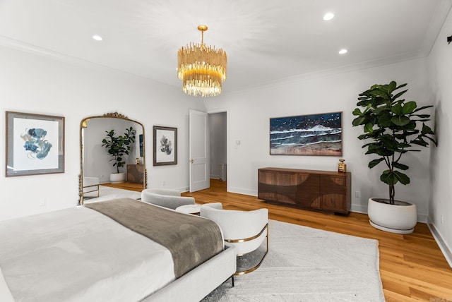 5204 Stonewall Rd, Little Rock, AR 72207 - bedroom with a notable chandelier, wood finished floors, recessed lighting, baseboards, and ornamental molding