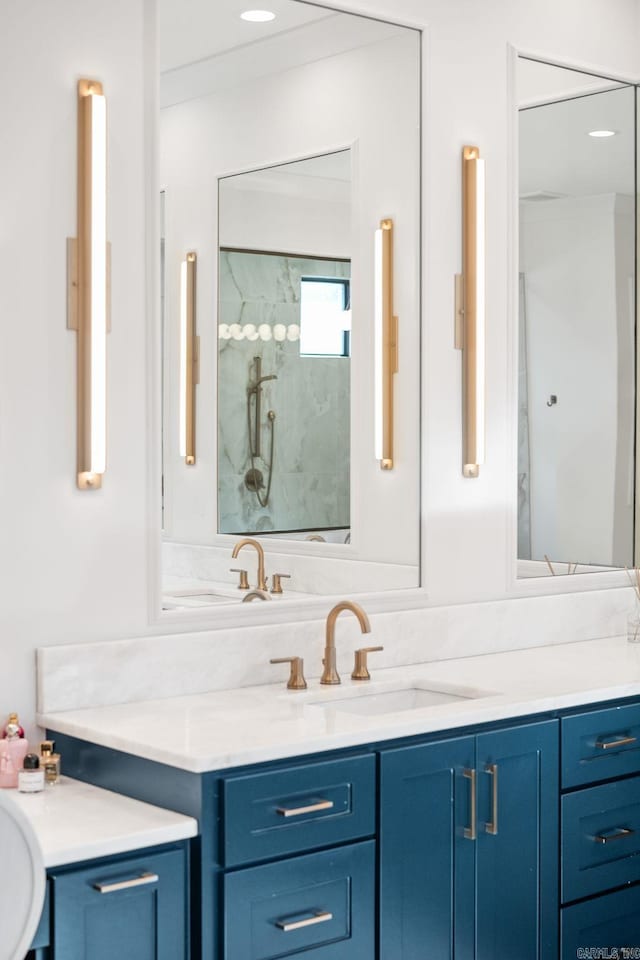 5204 Stonewall Rd, Little Rock, AR 72207 - full bathroom with vanity, recessed lighting, and walk in shower