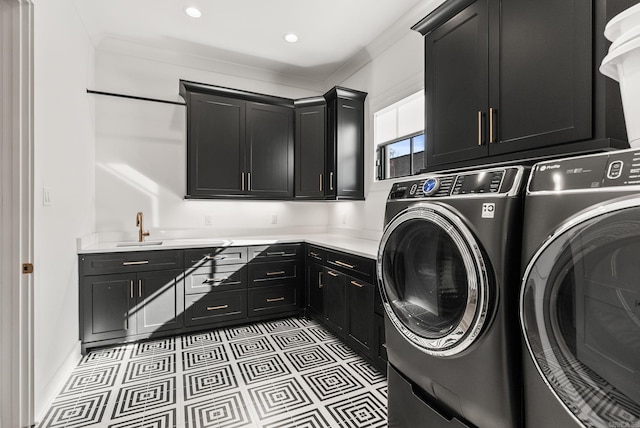 5204 Stonewall Rd, Little Rock, AR 72207 - washroom with washer and clothes dryer, crown molding, recessed lighting, a sink, and cabinet space