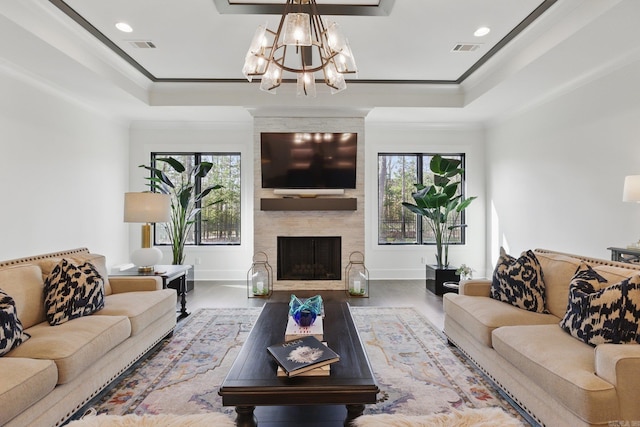 125 Hallen Ln, Little Rock, AR 72223 - living room featuring visible vents, a chandelier, crown molding, and a raised ceiling