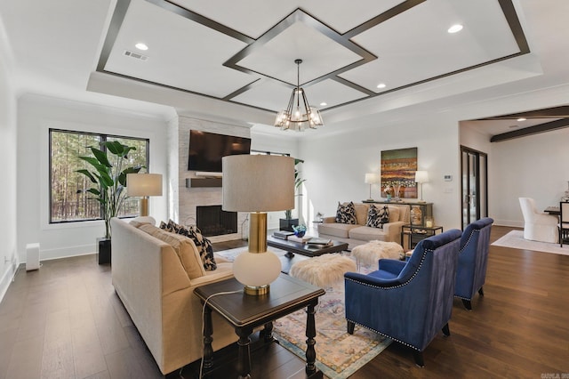 125 Hallen Ln, Little Rock, AR 72223 - living room with visible vents, a notable chandelier, baseboards, and dark wood finished floors
