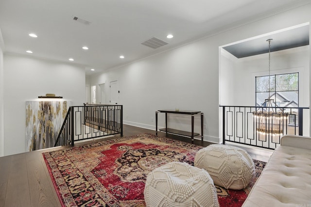 125 Hallen Ln, Little Rock, AR 72223 - sitting room with an upstairs landing, baseboards, visible vents, ornamental molding, and recessed lighting
