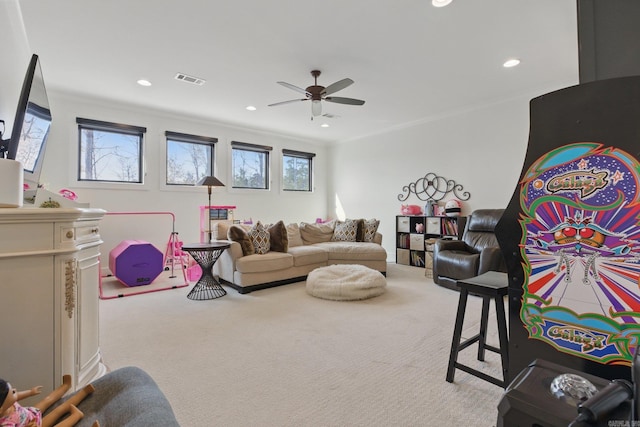 125 Hallen Ln, Little Rock, AR 72223 - carpeted living area featuring a ceiling fan, recessed lighting, crown molding, and visible vents