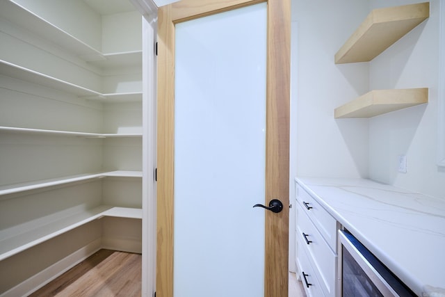 9 Marchwood Cv, Little Rock, AR 72210 - pantry featuring beverage cooler
