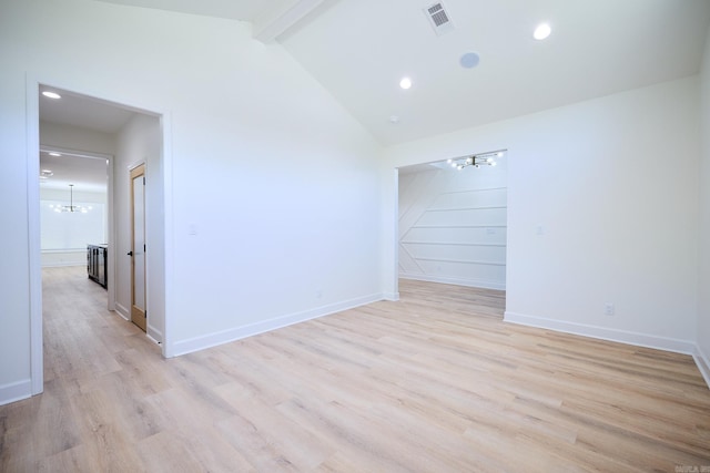 9 Marchwood Cv, Little Rock, AR 72210 - empty room with a notable chandelier, lofted ceiling with beams, light wood-type flooring, baseboards, and visible vents