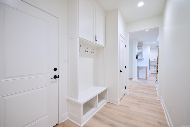 9 Marchwood Cv, Little Rock, AR 72210 - mudroom with baseboards, light wood-style floors, and recessed lighting