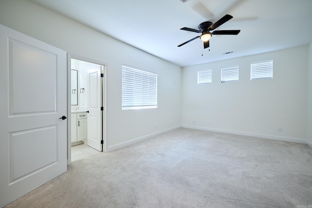 9 Marchwood Cv, Little Rock, AR 72210 - unfurnished room featuring a ceiling fan, plenty of natural light, light carpet, and visible vents