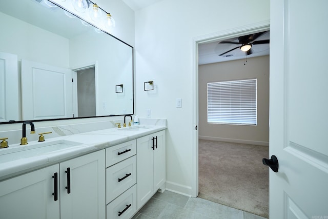 9 Marchwood Cv, Little Rock, AR 72210 - full bath with double vanity, visible vents, a sink, and a ceiling fan