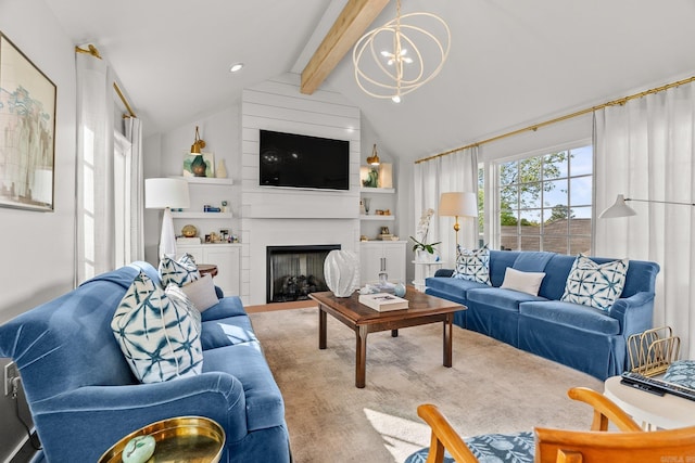 living room with vaulted ceiling with beams, a notable chandelier, and a large fireplace