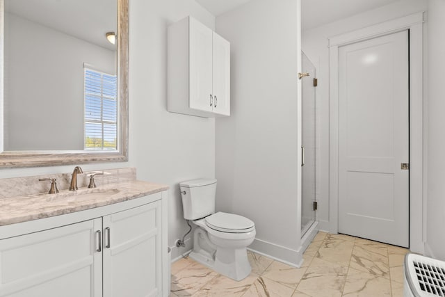 full bathroom with toilet, vanity, a shower stall, marble finish floor, and baseboards