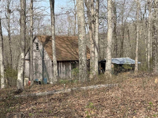 150 Woopsie Dr, Leslie, AR 72645 - exterior space with an outbuilding and a barn