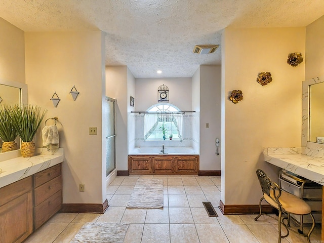 full bathroom with a stall shower, tile patterned floors, visible vents, and a garden tub