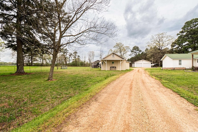 exterior space featuring dirt driveway