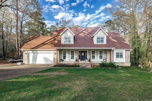 cape cod home featuring a garage, a front lawn, driveway, covered porch, and a shingled roof