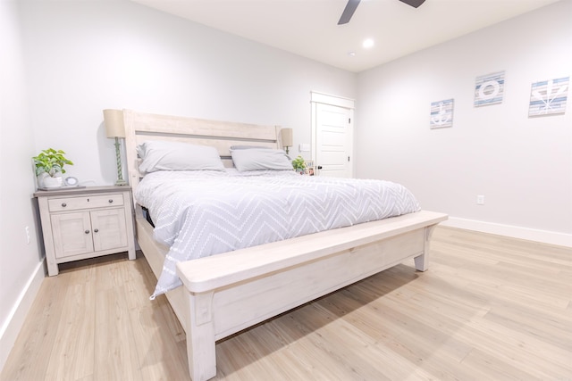 bedroom featuring baseboards, light wood-style floors, ceiling fan, and recessed lighting